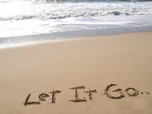 Let it Go written in the sand